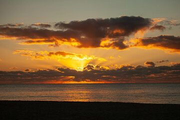 A beautiful sunrise or sunset on the ocean in the Bahamas.