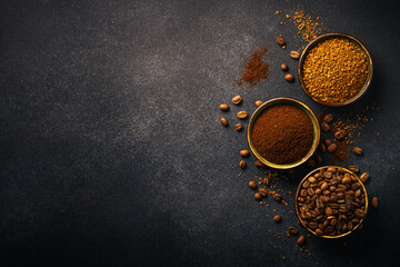 Roasted coffee beans, ground coffee and instant coffee in bowls at dark background.