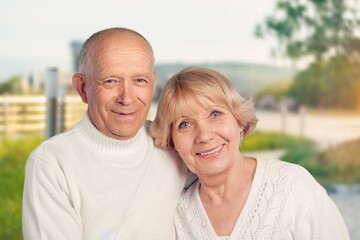 old happy couple have fun at park