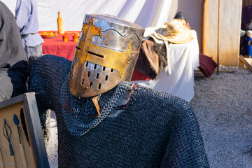 Medieval helmet and chain mail armor at a medieval party