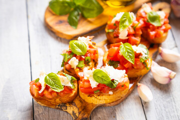 Italian bruschetta bread with tomato, basil and mozzarella cheese