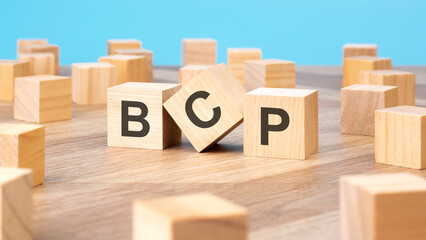 BCP written on wooden cube, business concept