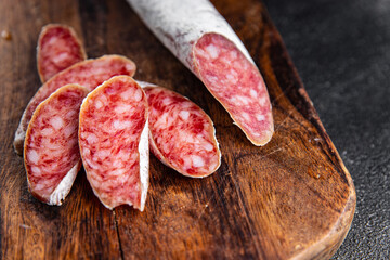 Fuet sausage cured spanish meat product meal food snack on the table copy space food background...
