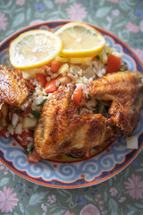 Grilled chicken wings with bulgur salad