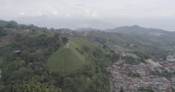 Top of a Green Hill in Front of the Colonial City called Jerico on a Cloudy Day - Shot in D-Log