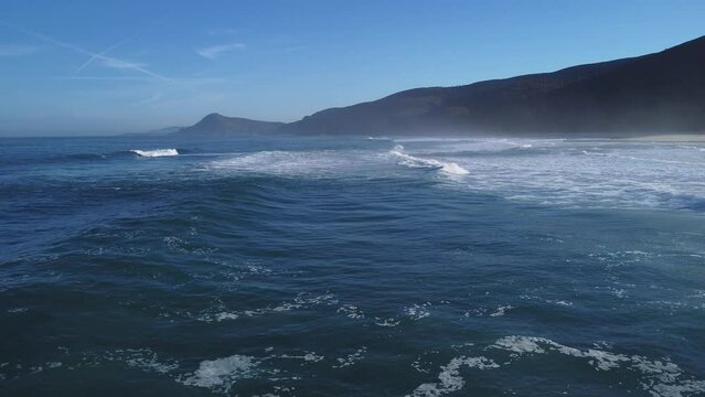 Waves arriving at a beautiful Galician beach on the Atlantic coast
