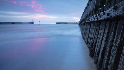 Dawn at Blyth Piers and harbour mouth.  Northumberland, England, UK.