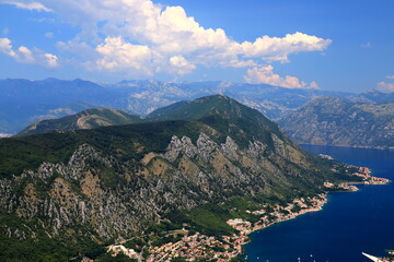 Fototapeta na wymiar Beautiful Kotor Bay and old city Kotor surrounded by high mountains in Montenegro. Full top view boka kotorska