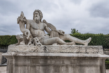 The ancient Sculpture in Paris Jardin des Tuileries (Tuileries garden). Garden was created by Catherine de Medici in 1564. Paris, France.