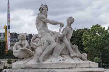 The ancient Sculpture in Paris Jardin des Tuileries (Tuileries garden). Garden was created by Catherine de Medici in 1564. Paris, France.