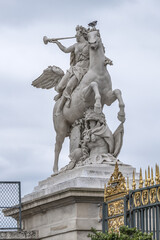Fototapeta na wymiar The ancient Sculpture in Paris Jardin des Tuileries (Tuileries garden). Garden was created by Catherine de Medici in 1564. Paris, France.