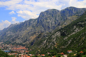Beautiful Kotor Bay and old city Kotor surrounded by high mountains in Montenegro. Full top view boka kotorska