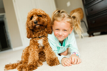 little girl with a dog