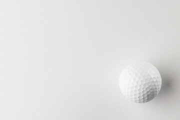 High angle view of white golf ball with copy space on white background