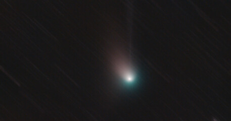A real picture of the green comet C/2022 E3 (ZTF) in our solar system which has an orbital period...