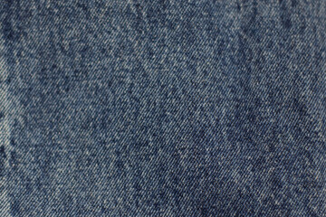 Naklejka premium Denim fabric of a pair of jeans, blue.
