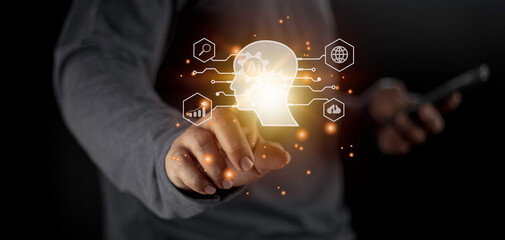 Businessman using light bulbs icon intelligence Ai. Chat bot with AI Artificial Intelligence, Futuristic technology, robot in online system.