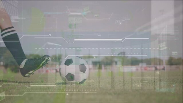 Animation of digital screen with data over legs of caucasian woman kicking soccer ball