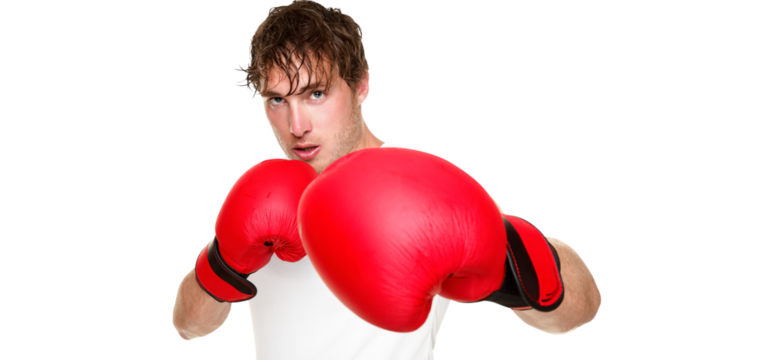 Fitness boxer boxing. Man punching with red boxing gloves isolated in transparent PNG. Fit fitness boxer sweating looking at camera. Caucasian male fitness model in his 20s. - Powered by Adobe