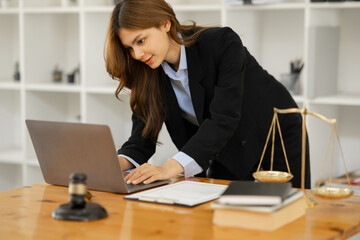 Businesswoman Lawyers having  Concepts of  Legal services at the law office work Legal advice online