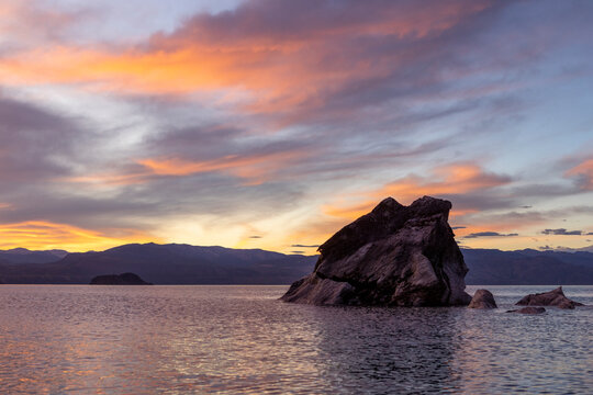 Kayak tour around the famous marble caves Catedral de Marmol, Capilla de Marmol and the tunnel of marble right after sunrise - Traveling Chile