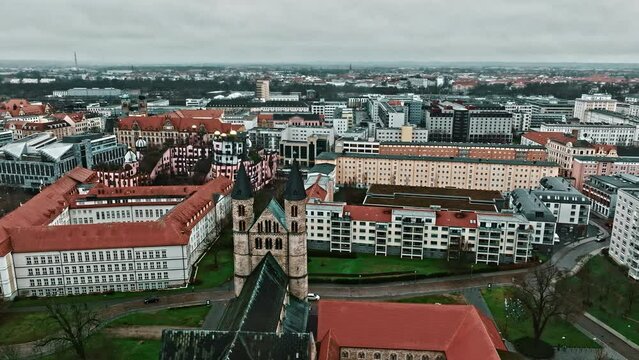 Drone shot revealing Kloster church (Klosterkirche) near Kunstmuseum Magdeburg - Kloster Unser Lieben Frauen (Kunstmuseum Magdeburg - Monastery Of Our Lady) , Magdeburg, Germany