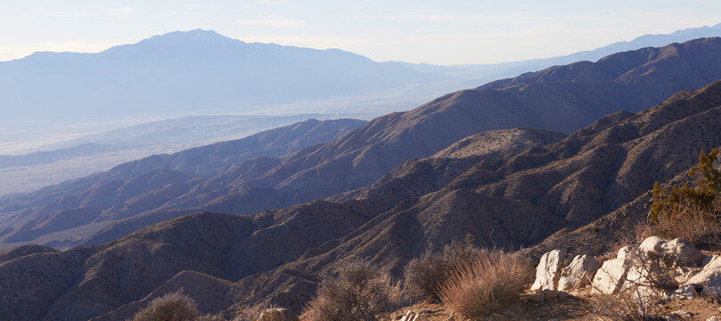 Panoramic scenic view from the top of a mountain looking over Joshua Tree National Park in California USA