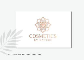 Luxury mandala floral beauty spa logo design with rose gold color