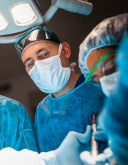 Maxillofacial residents observing a procedure