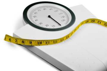A Measuring Tape on a Weight Scale