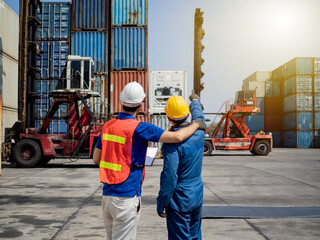 Male engineer supervisor person talk speak discussion pointing finger cheerful businessman people labor staff people group yellow hardhat helmet safety work job import export logistic container