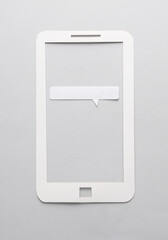 Paper cut Smartphone with speech bubble on gray background. Creative minimalist layout