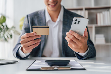 Portrait of bookkeepers asia business man working on tax consultant law in a modern office. Make an account analysis report. real estate investment information financial and tax system concepts