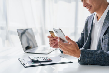 Portrait of bookkeepers asia business man working on tax consultant law in a modern office. Make an account analysis report. real estate investment information financial and tax system concepts