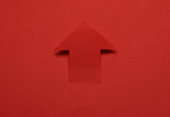 Paper cut red arrow close up