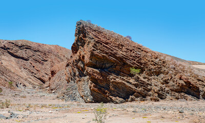 Volcanic landscape of Burnt Mountain - Massive granite rock formation in the Mountains, Namibia