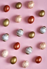 Colorful Easter Eggs a pastel pink background. Vertical Banner for easter holiday. Flat lay composition