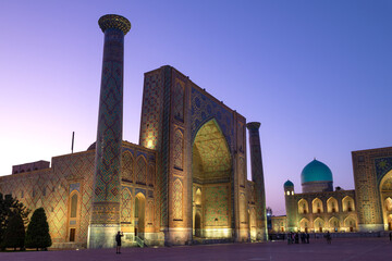 Ancient Ulugbek  madrasah on Registan square on a evening twilight. Samarkand, Uzbekistan