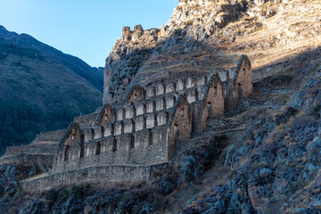 Background photographs of the Qolqas in the citadel of Ollantaytambo in the Sacred Valley of the...