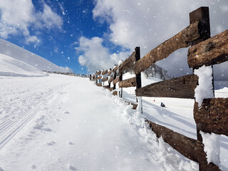 snow path and fence to the top of the mountain in anilio ski center metsovo greece