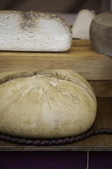 Old cheeses in a market