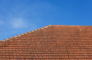 Naklejka premium red weathered tile roof