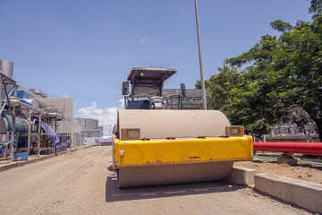 Land scraper and Vibro roller the heavy equipment for pretreatment road construction. photo is...