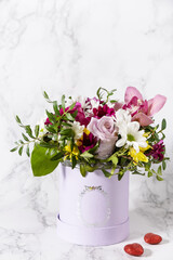 Happy Mothers Day background with dainty flowers. Beautiful greeting card. Holiday concept. Copy space.