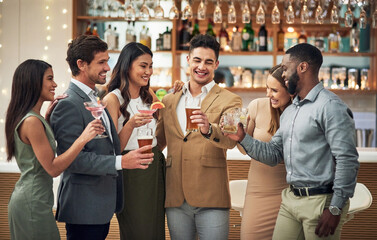 Group, friends and toast for celebration, party and happiness together, smile and bonding. Young people, diversity and team in restaurant, cheers and alcohol for event, congrats or success with smile