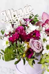 Happy Mothers Day background with dainty flowers. Beautiful greeting card. Holiday concept.