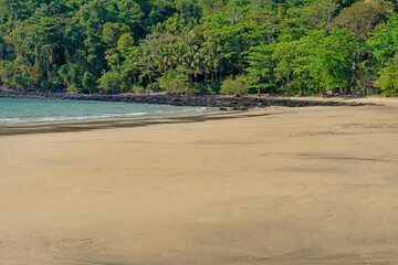 Close up of sand on beach and blue summer sky. Panoramic landscape on the beach. Empty tropical beach