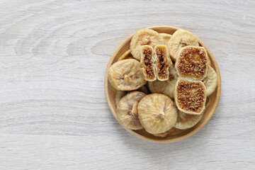 Dried figs turkey in a bowl on wooder background, Healthy eating concept,Common fig (Ficus carica L.)