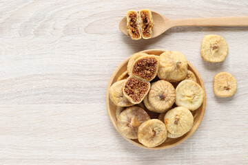 Dried figs turkey in a bowl on wooder background, Healthy eating concept,Common fig (Ficus carica L.)