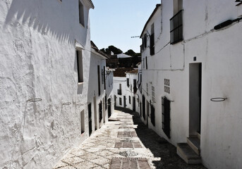 narrow white street in the spanish town
